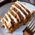 Moist vegan carrot cake with easy orange frosting